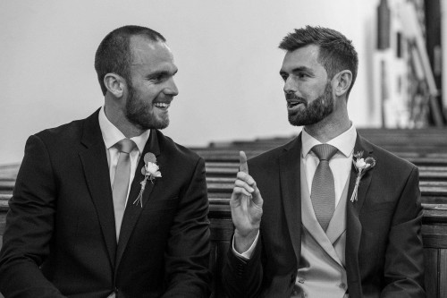 Groom and Best Man joke - Documentary wedding photography