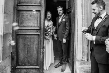 Bride and Groom Bubble Confetti. Wedding Ceremony at Trinity College Oxford. Oxford University Wedding Photography by Matthew Ellacott Photography