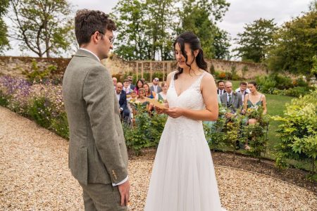 Outdoor wedding ceremony at The Medley Walled Garden in Oxford