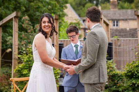Outdoor wedding ceremony at The Medley Walled Garden in Oxford