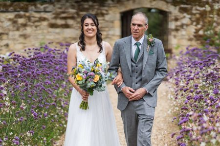 Outdoor wedding ceremony at The Medley Walled Garden in Oxford