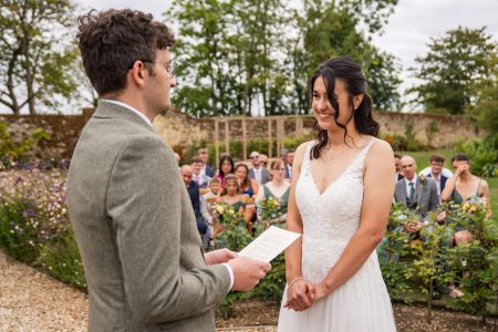 Outdoor wedding ceremony at The Medley Walled Garden in Oxford
