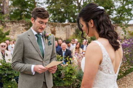 Outdoor wedding ceremony at The Medley Walled Garden in Oxford