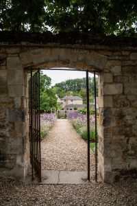 Outdoor wedding ceremony at The Medley Walled Garden in Oxford