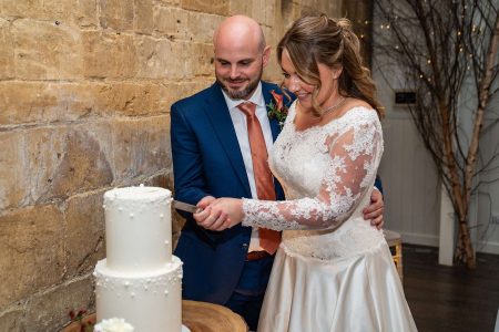 Wedding Cake Cutting - Wedding Photography at Lapstone Barn Cotswlod Wedding Venue. Photographed by Matthew Ellacott Photography